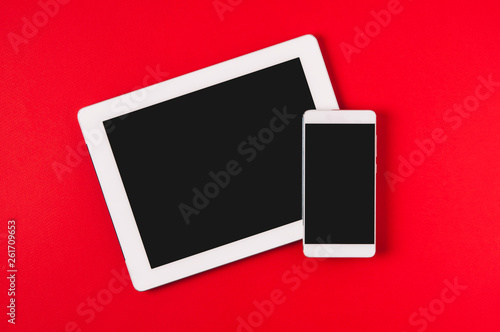 Free Download Mobile phone and tablet on red background. Template for text or application design - GFXLoad