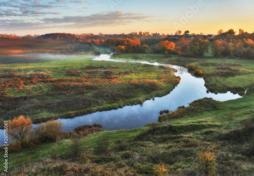 autumn morning. picturesque sunrise in the valley of the river. foggy morning © sergnester