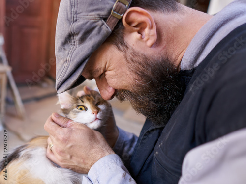 Closeup of a man with his cat