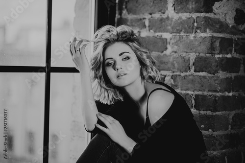 Blonde girl with curly hair/advertising