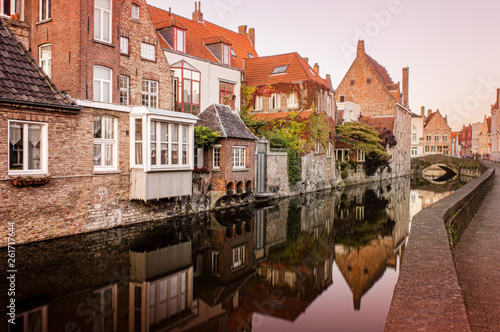 Reflections on the canal water, in Bruges