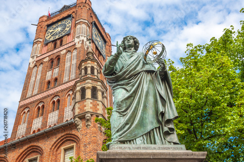 Famous statue of astronomer a (Mikolaj Kopernik) in Torun. Poland photo