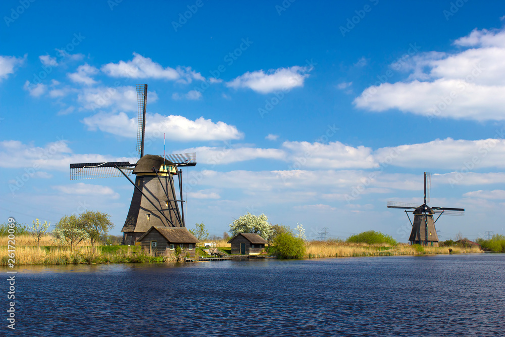 rural lanscape with windmills at famous tourist site Kinderdijk in Netherlands