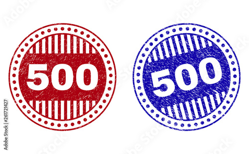 Grunge 500 round stamp seals isolated on a white background. Round seals with grunge texture in red and blue colors. Vector rubber imitation of 500 caption inside circle form with stripes.