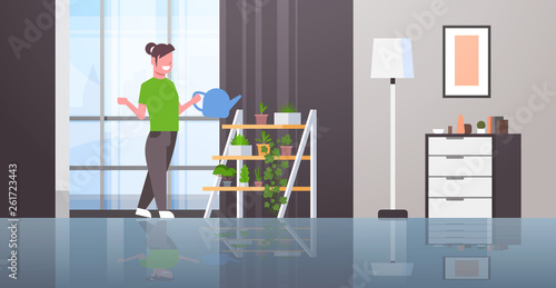 housewife watering potted plants smiling woman holding sprinkling can girl doing housework household concept modern living room interior female cartoon character full length flat horizontal