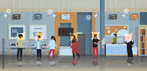 mix race customers choosing digital devices identification facial recognition concept modern electronics store shop interior security camera surveillance cctv system horizontal full length