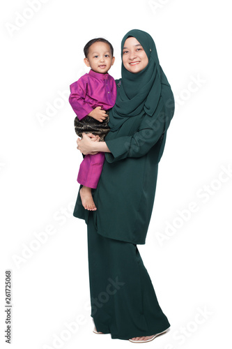 Mother and son posing during Raya celebration