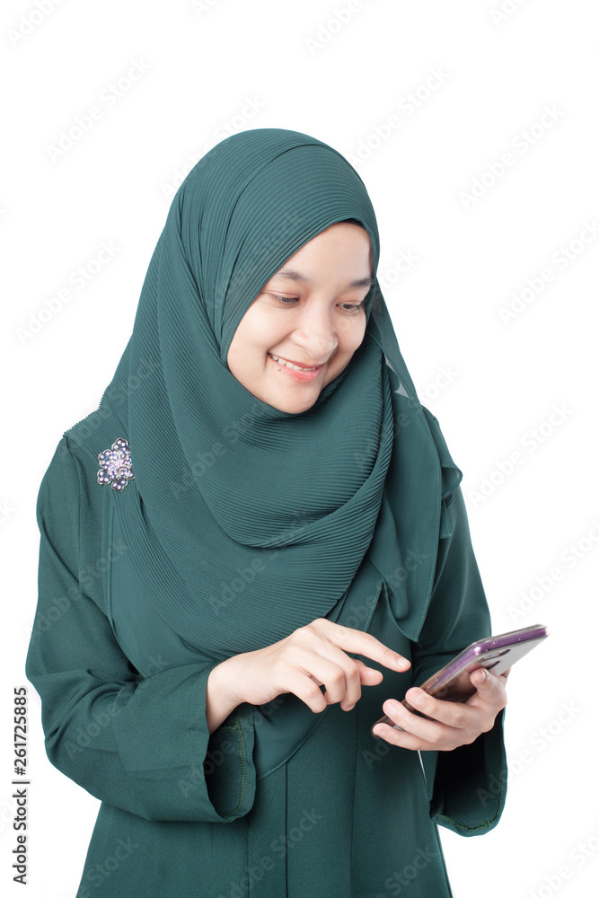 Malay woman using mobile phone Malay woman using mobile phone