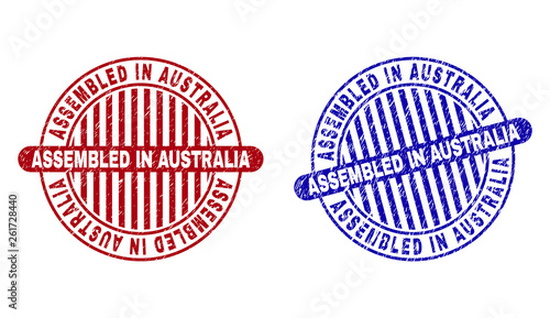Grunge ASSEMBLED IN AUSTRALIA round stamp seals isolated on a white background. Round seals with grunge texture in red and blue colors.