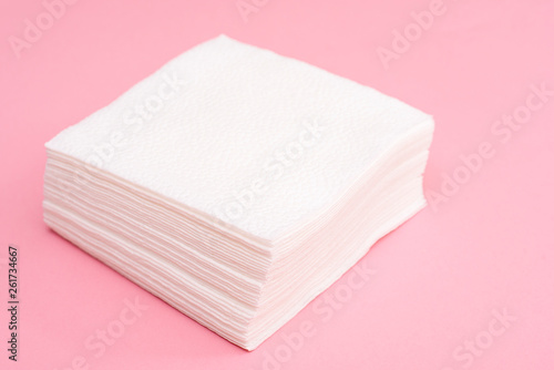 Stack of white square paper napkins