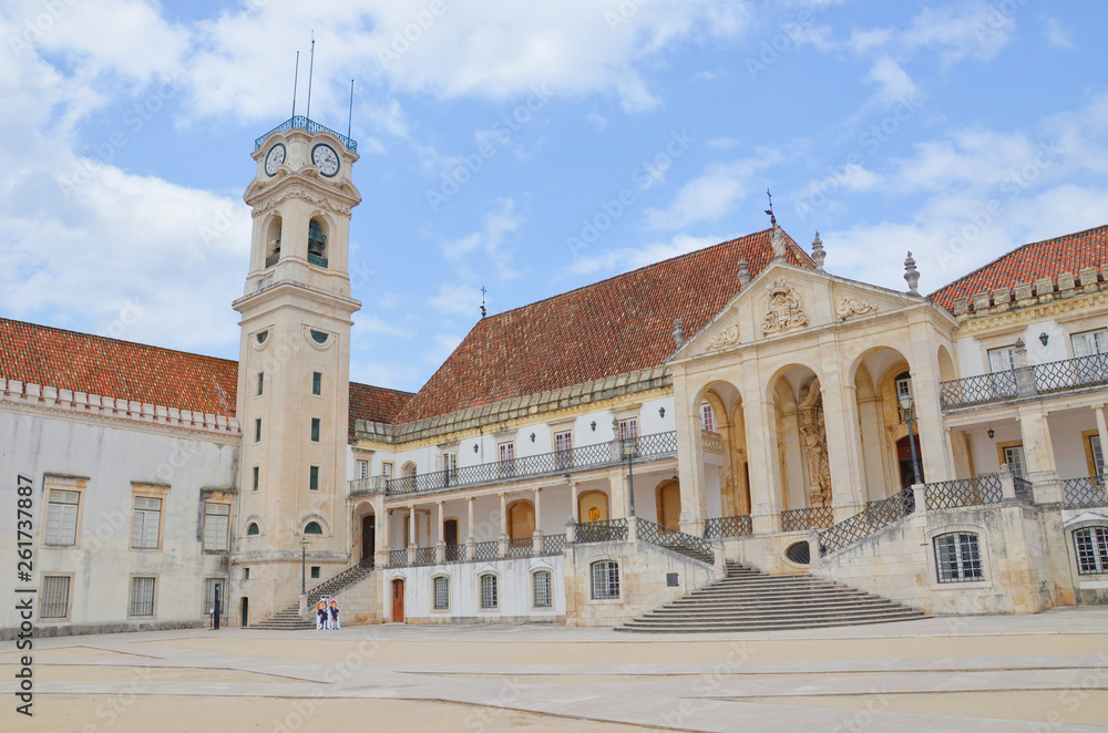 Beautiful tower and nearby courtyard in the campus of the University of Coimbra, Portugal. It is the oldest university of the country, since 2013 part of UNESCO World Heritage List.