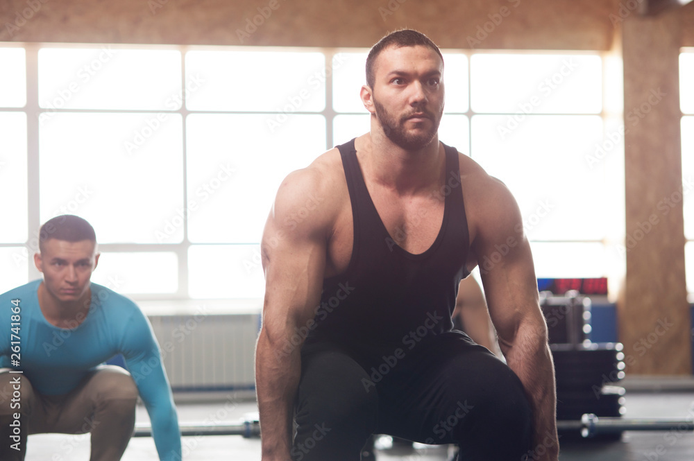 Portrait of Young Strong Man Training with Barbell Portrait of Young Strong Man Training with Barbell
