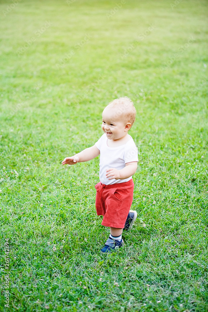 happy little kids playing in park outdoors happy little kids playing in park outdoors