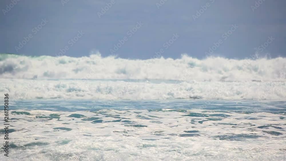 Scenic waves of Atlantic Ocean slow motion rushing to a black pebble shore of Tenerife Scenic waves of Atlantic Ocean slow motion rushing to a black pebble shore of Tenerife