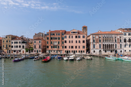 Panoramic view of Venice narrow canal with historical buildings and boat © TravelFlow