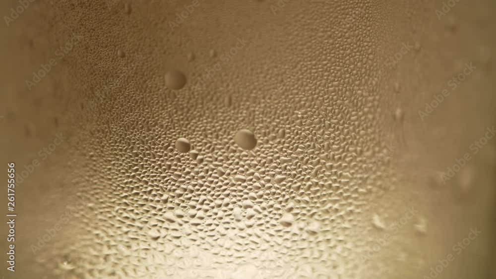 Condensation forming on a glass in a timelapse Condensation forming on a glass in a timelapse