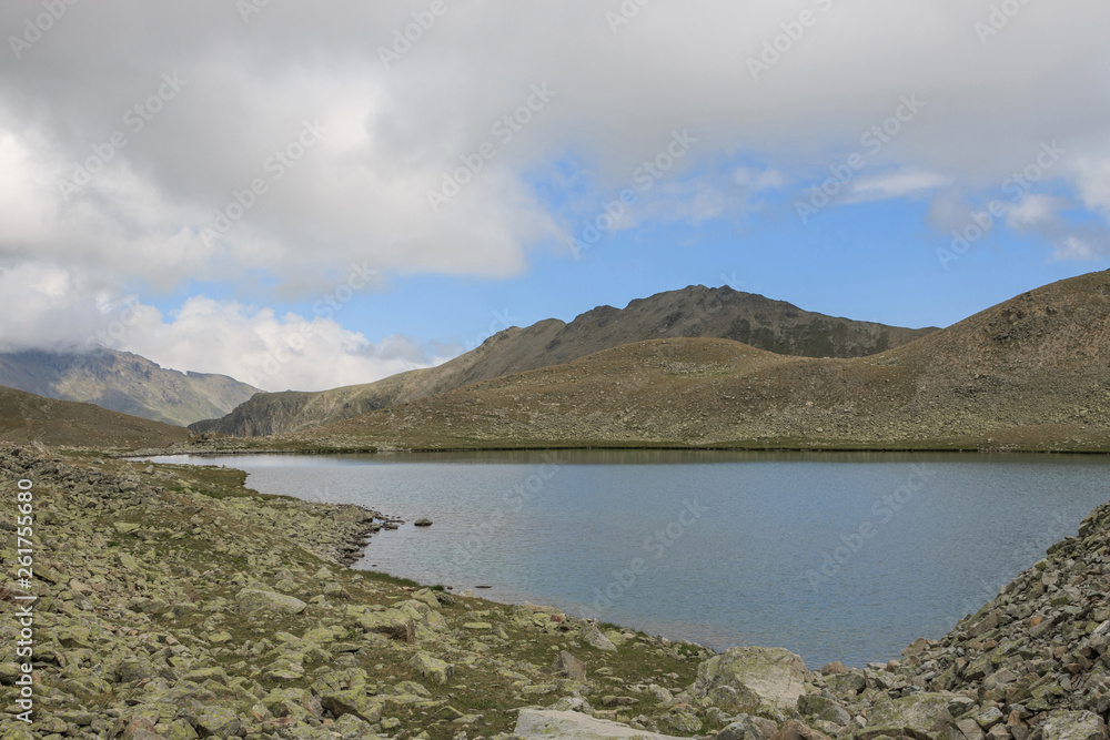 Panorama of lake scenes in mountains, national park Dombay, Caucasus