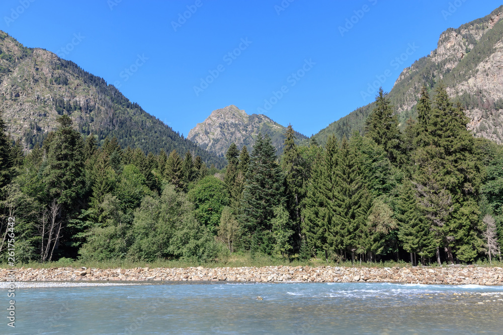Panorama view of river scene in mountains of national park Dombay, Caucasus Panorama view of river scene in mountains of national park Dombay, Caucasus