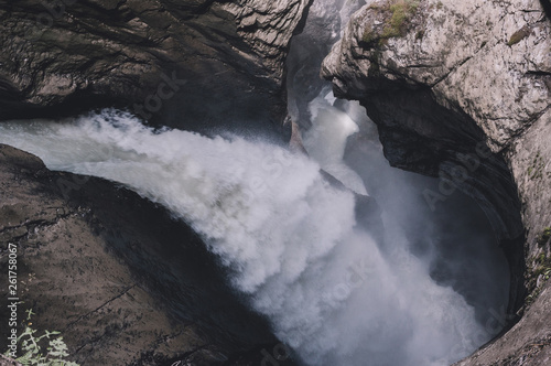 View closeup waterfall of Trmmelbach fall in mountains  valley of waterfalls