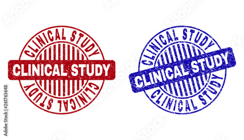 Grunge CLINICAL STUDY round stamp seals isolated on a white background. Round seals with distress texture in red and blue colors.