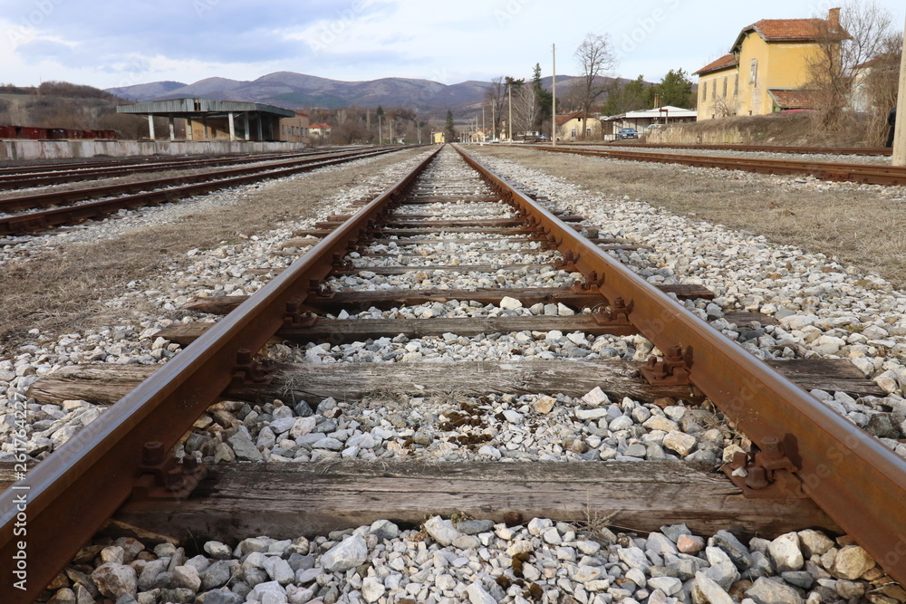 Top view on Train Tracks. Close up of train tracks. Railway close up, Train tracks, Rail-train infrastructure. Railway close up. Direction, journey.