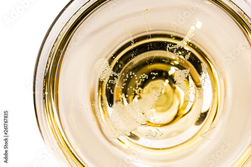 фотографія tiny bubbles in a champagne glass from above