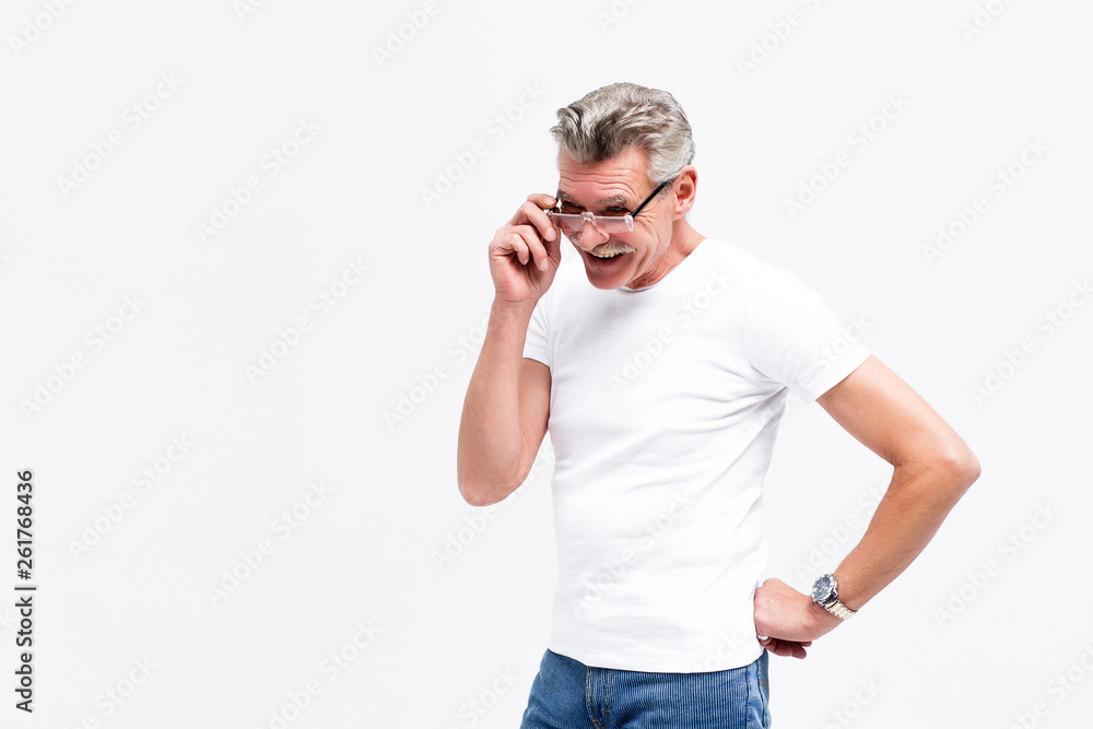 Confident grey hair senior man holding on his eyeglasses iaolated on white! Confident grey hair senior man holding on his eyeglasses iaolated on white!