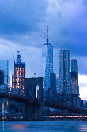 Brooklyn Bridge and Lower Manhattan at dusk © softdelusion