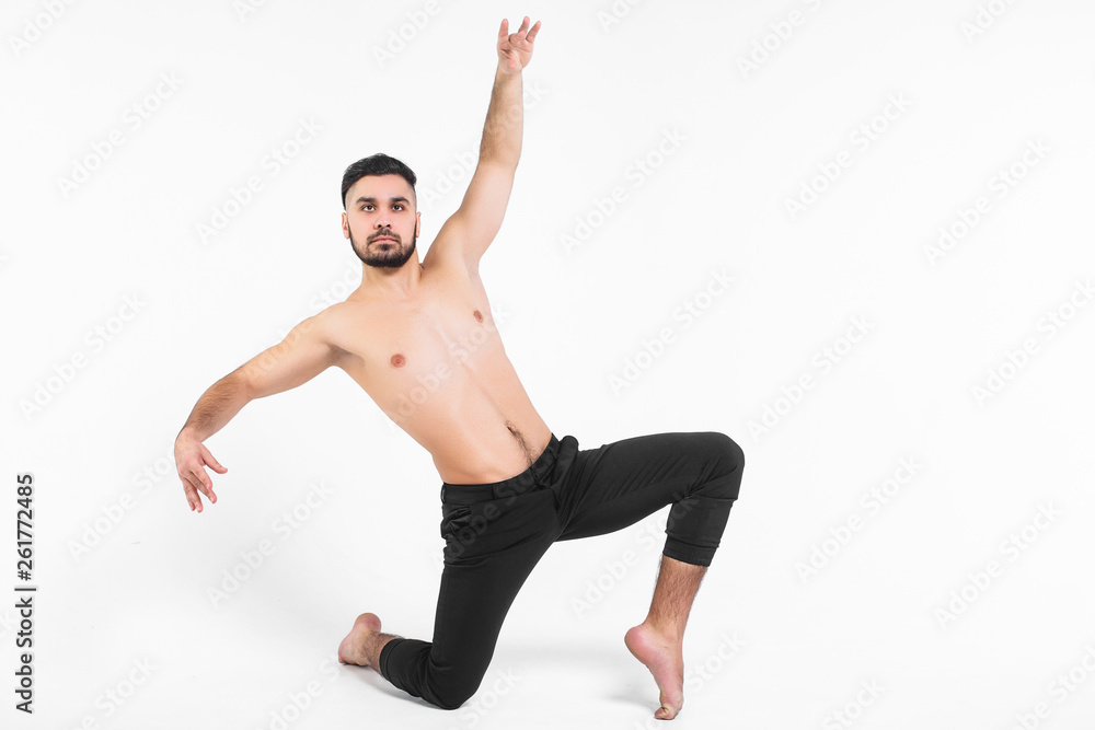 Flexibility. Fitness and healthy lifestyle. Sexy man and a healthy . Sport and strength. Flexibility. Fitness and healthy lifestyle. Sexy man and a healthy . Sport and strength.