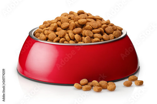 Dry cat food in a red bowl, isolated on white background