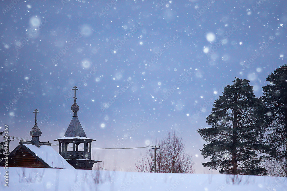 Fototapeta premium landscape in russian kizhi church winter view / winter season snowfall in landscape with church architecture