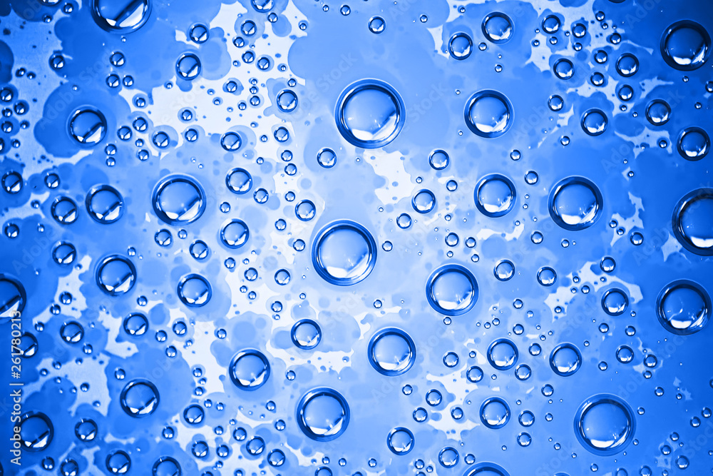 fresh drops background blue glass / wet rainy background, water drops transparent glass blue