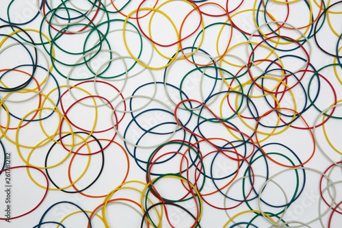 abstract background with colored rubber bands for money on a white background