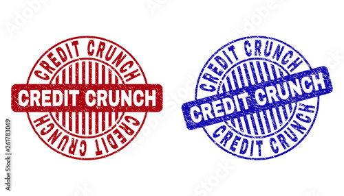 Grunge CREDIT CRUNCH round stamp seals isolated on a white background. Round seals with grunge texture in red and blue colors.