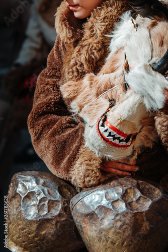 The holidays Kukeri are elaborately costumed Bulgarian men, and sometimes women, who perform traditional rituals intended to scare away evil spirits