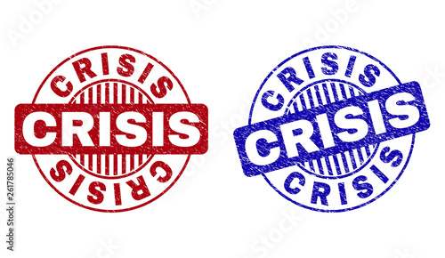 Grunge CRISIS round stamp seals isolated on a white background. Round seals with grunge texture in red and blue colors. Vector rubber imprint of CRISIS title inside circle form with stripes.