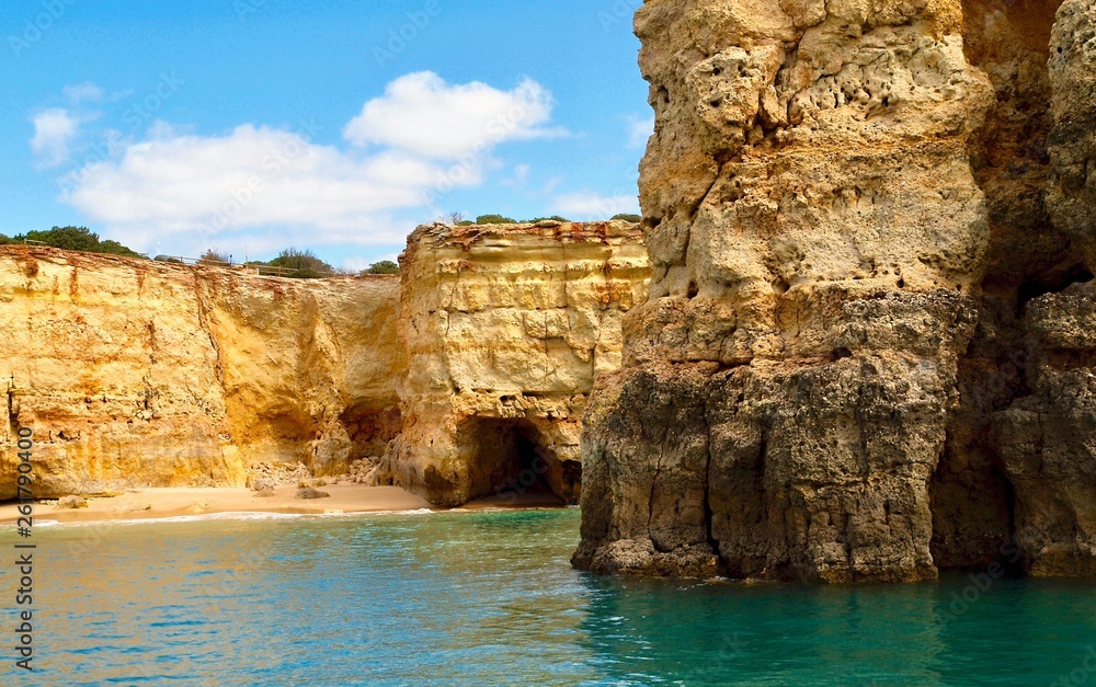 Beautiful caves in turquoise water between Albufeira and Benagil cave