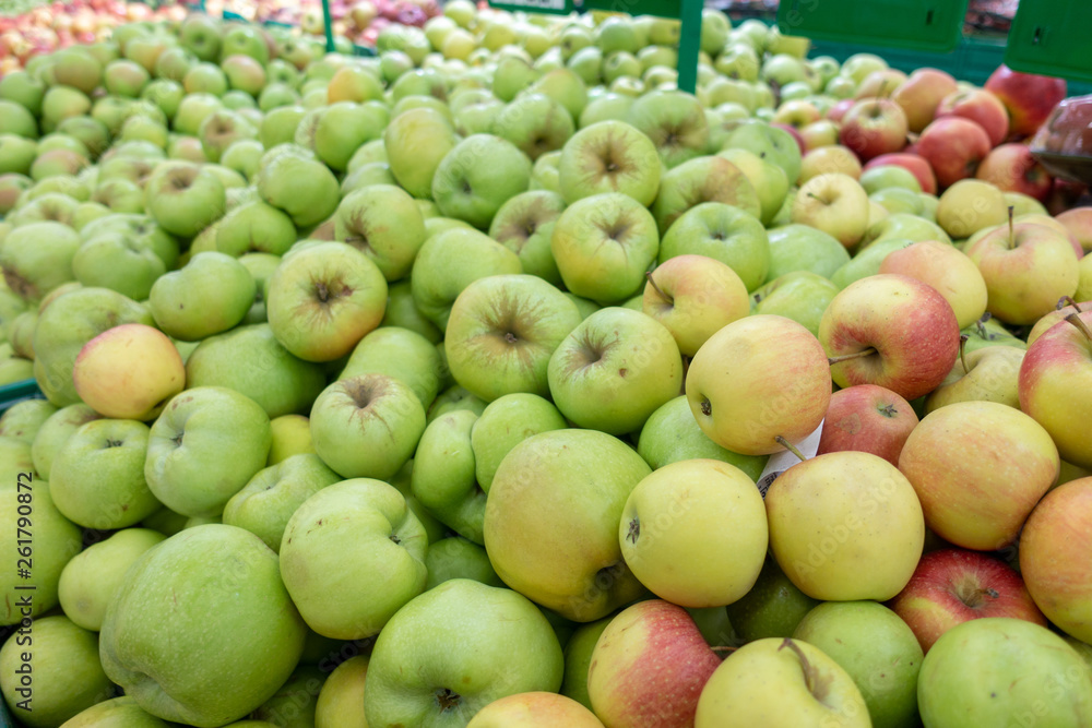 Red and green apple fruits in a supermarket Red and green apple fruits in a supermarket