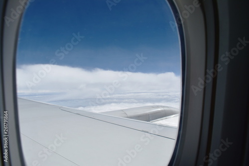 close up of plane window frame height in sky © pedphoto36pm