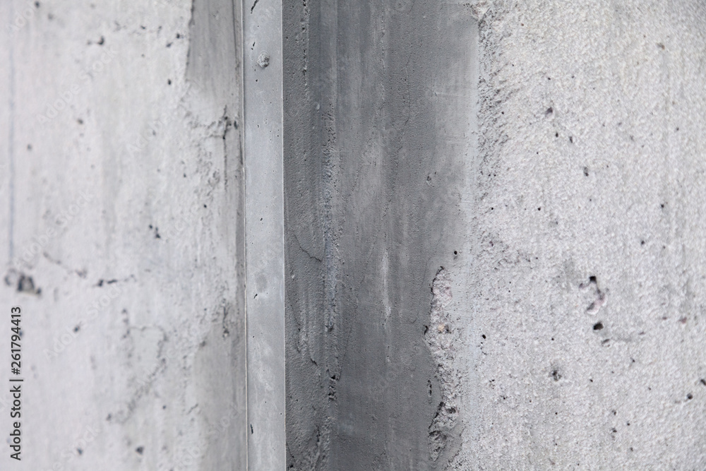 Texture background. Gray concrete wall with rough seams, mortar, plaster, abrasions, irregularities. Concept construction of country house, cottage, garage Texture background. Gray concrete wall with rough seams, mortar, plaster, abrasions, irregularities. Concept construction of country house, cottage, garage
