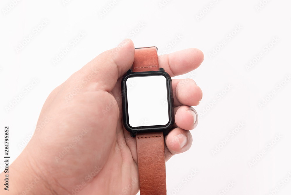 Hand holding Smart watch with brown genuine leather straps isolated on white Hand holding Smart watch with brown genuine leather straps isolated on white