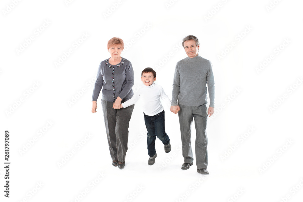 grandma and grandpa go with her grandson.isolated on white background grandma and grandpa go with her grandson.isolated on white background