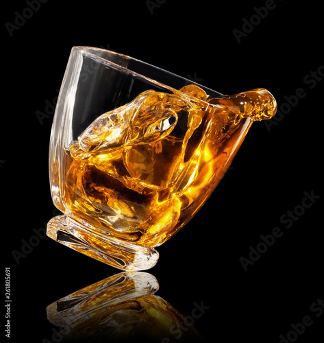splash of whiskey in glass