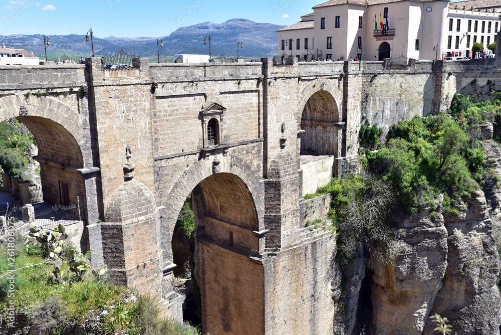 The Puerto Nuevo in Ronda an eighteenth century arched bridge over the El  Tajo river gorge in Andalucia southern Spain foto de Stock | Adobe Stock