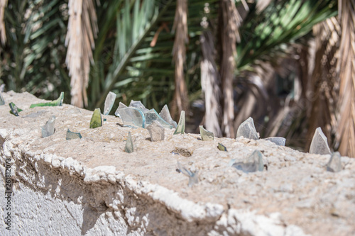 Photography Broken glass on top of wall