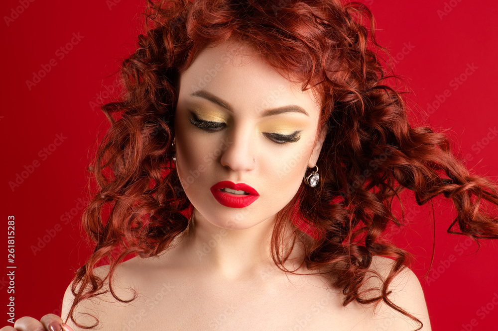 charming woman with bright makeup and beautiful curls hair