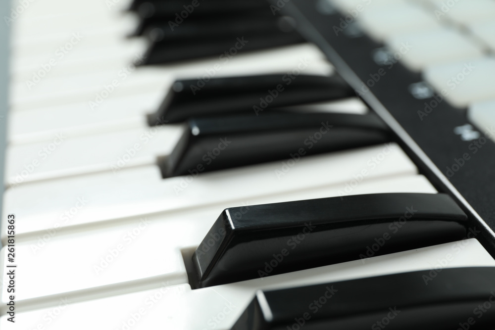 Portative modern midi keyboard as background, closeup Portative modern midi keyboard as background, closeup
