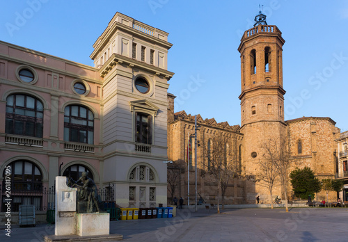 Photography Square in Sabadell with statue and church