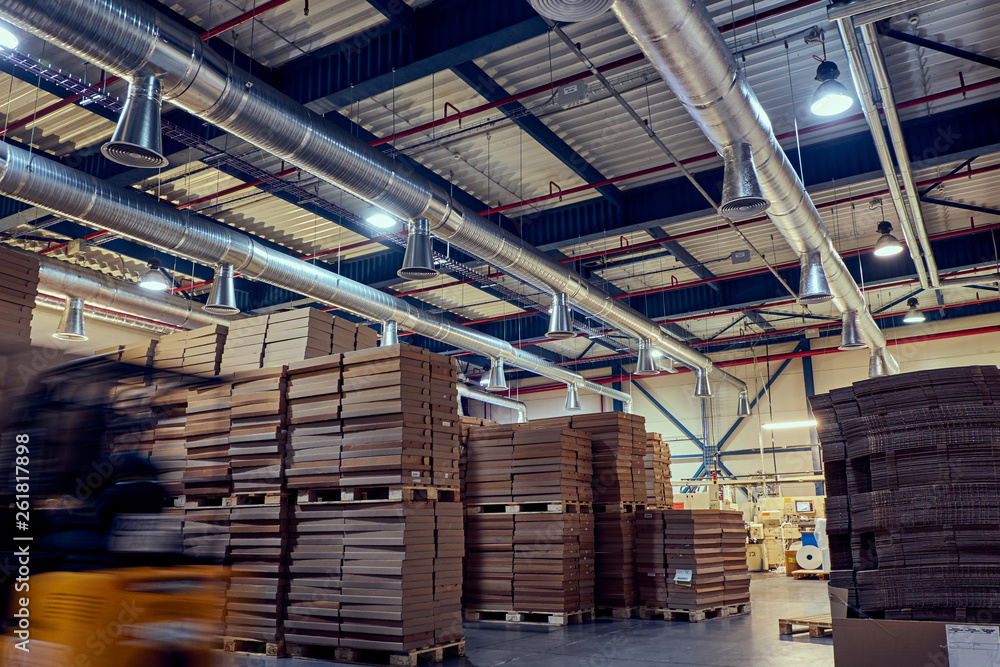 Warehouse with modern ventilation system full parcells. Photos | Adobe Stock