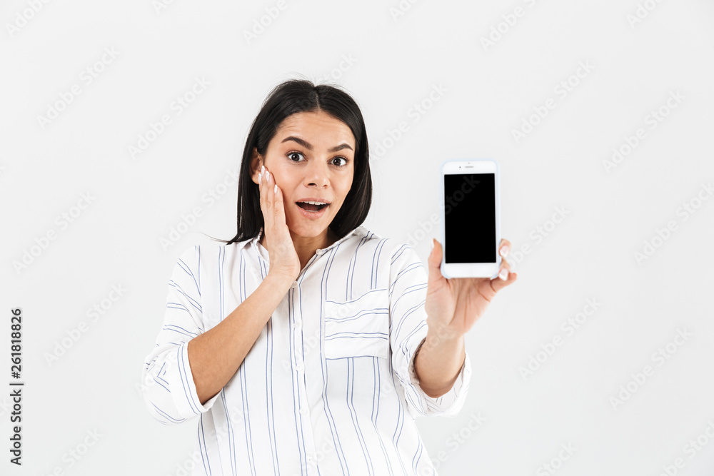 Image of beautiful pregnant woman 30s with big belly smiling and holding smartphone in hand Image of beautiful pregnant woman 30s with big belly smiling and holding smartphone in hand